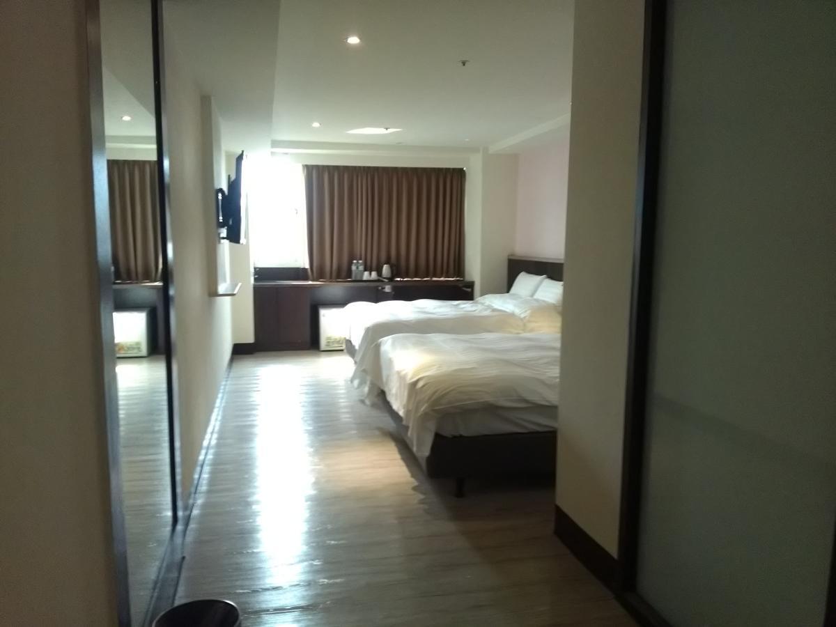 Dengfeng Milan Business Hotel Huwei Eksteriør bilde