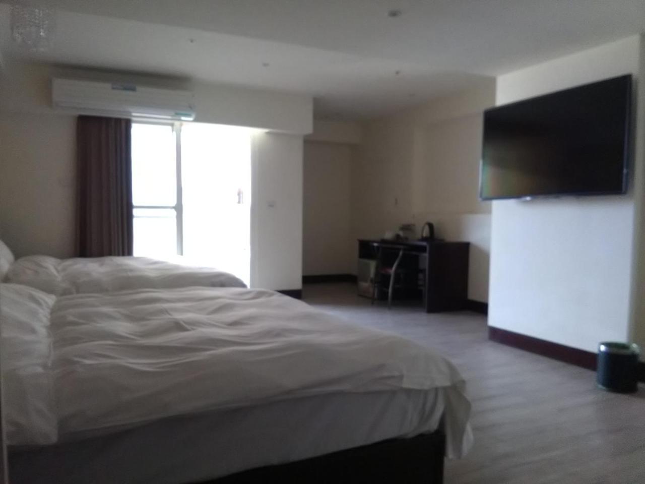 Dengfeng Milan Business Hotel Huwei Eksteriør bilde